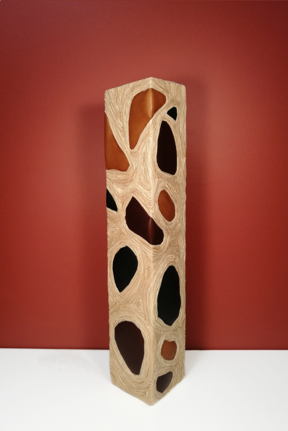 Sculpture cuir et raphia